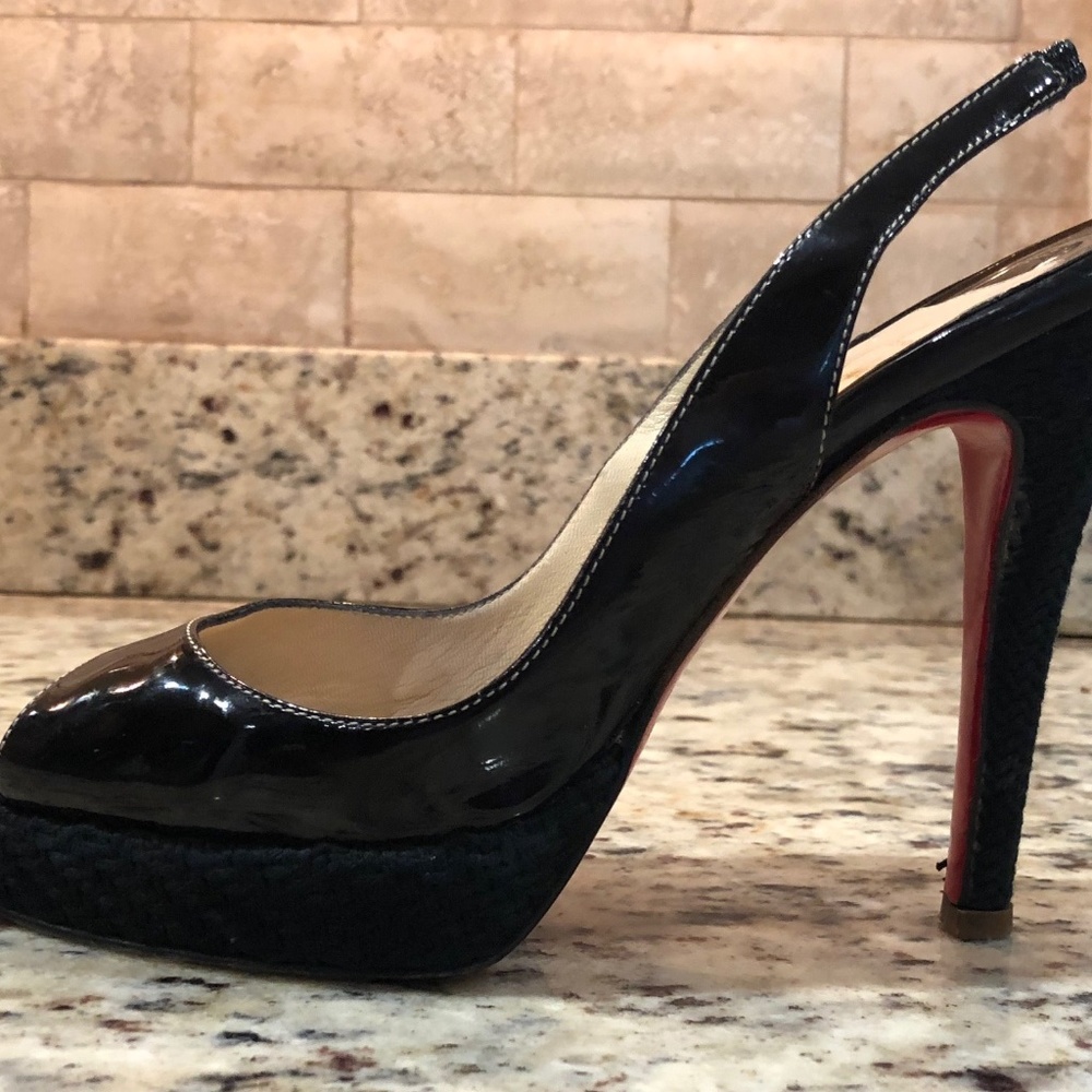 Christian Louboutin peep toe pumps